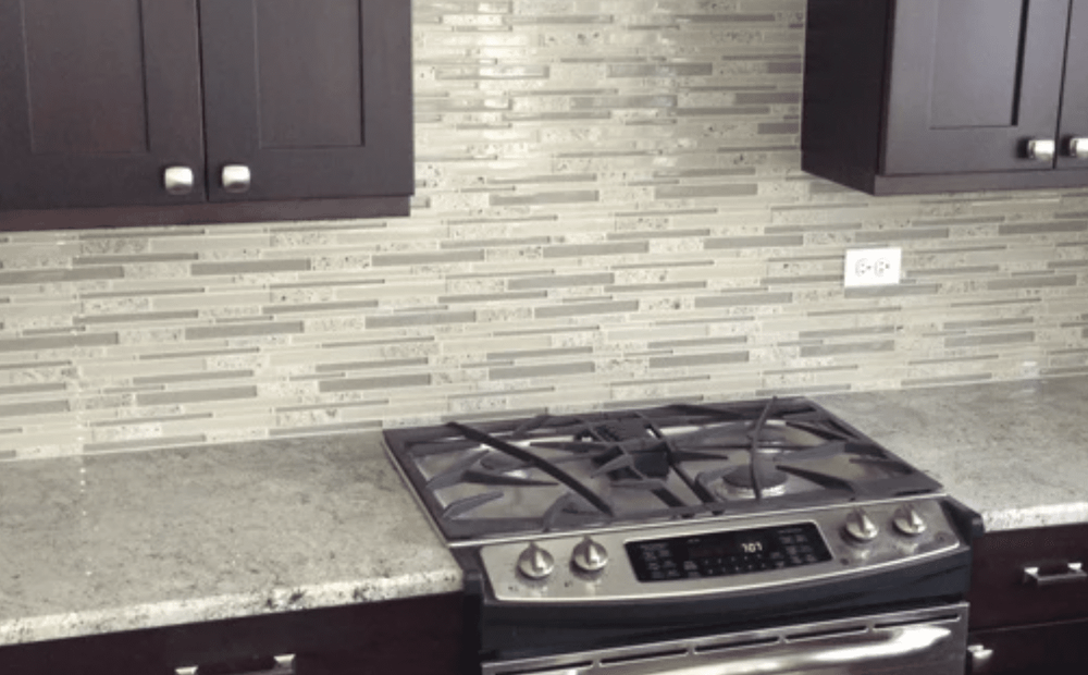 Tile backsplash and beautiful countertops in Wheaton, IL from Superb Carpets, Inc.